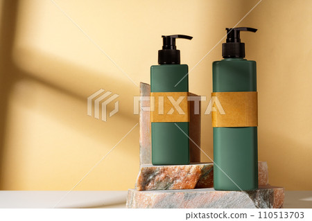 Cosmetic package dispenser with granite stone studio shot 110513703