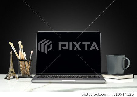 Working table with laptop on black background Working table with laptop on black background 110514129