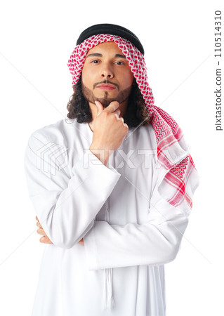 Pensive young man in traditional middle-east dress thobe on white background Pensive young man in traditional middle-east dress thobe on white background 110514310