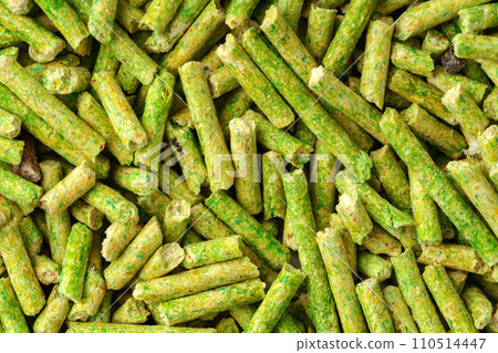 Green filler for cat litter box close up 110514447