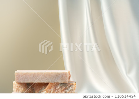 Stone podium decorated with white silk fabric for display 110514454