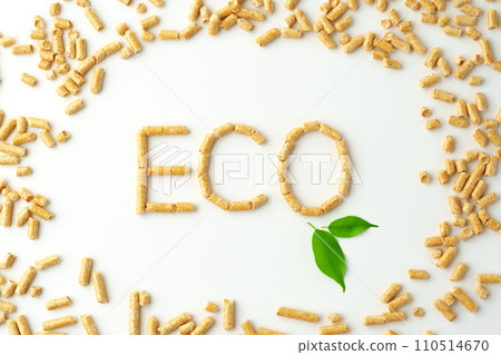 Wood pellets formed in word 'ECO' isolated on white background Wood pellets formed in word 'ECO' isolated on white background 110514670
