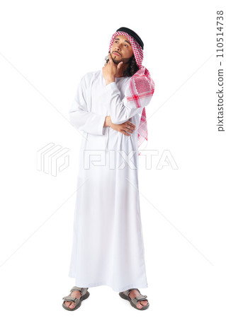 Pensive young man in traditional middle-east dress thobe on white background Pensive young man in traditional middle-east dress thobe on white background 110514738