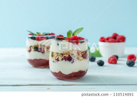 homemade raspberry and blueberry with yogurt and granola homemade raspberry and blueberry with yogurt and granola 110514891