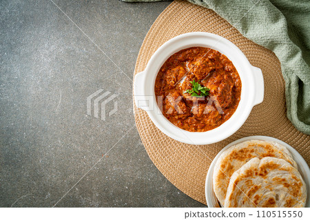 chicken tikka masala spicy curry meat food with roti or naan bread 110515550