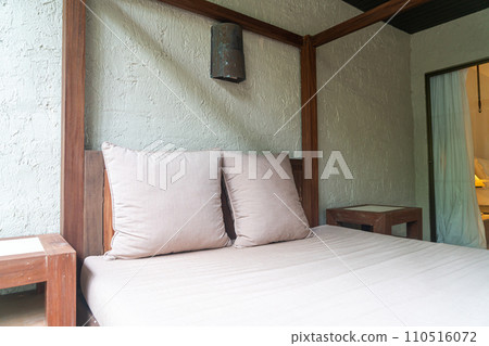 pillow decoration on outdoor patio bed 110516072