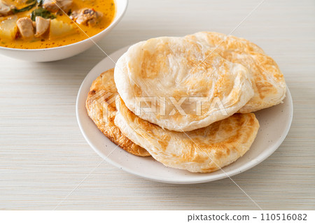 Chicken curry soup with roti Chicken curry soup with roti 110516082