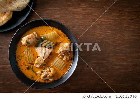 Chicken curry soup with roti Chicken curry soup with roti 110516086