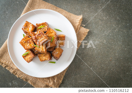 fried tofu with white sesame and teriyaki sauce 110516212