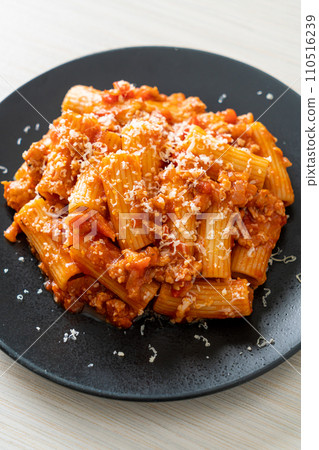 Rigatoni pasta bolognese with cheese 110516239