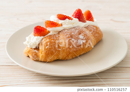 strawberry fresh cream croissant on plate strawberry fresh cream croissant on plate 110516257