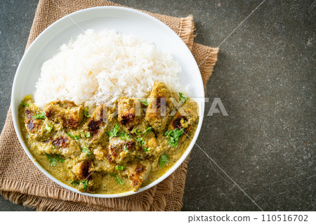 Afghani chicken in green curry or Hariyali tikka chicken hara masala with rice Afghani chicken in green curry or Hariyali tikka chicken hara masala with rice 110516702