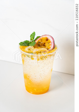 passion fruit mango mojito in glass 110516832