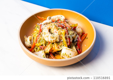 fettuccini spaghetti pesto seafood on plate fettuccini spaghetti pesto seafood on plate 110516891