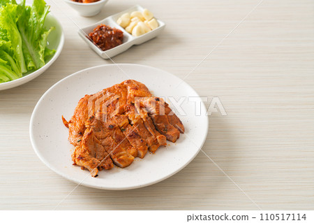 grilled pork marinated Kochujang sauce in Korean style with vegetable and kimchi 110517114