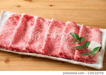 Sukiyaki meat served on a plate, domestic Wagyu beef shoulder loin 110518759