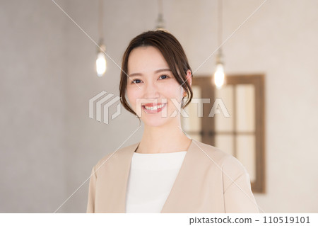 Young office casual woman looking at camera Young office casual woman looking at camera 110519101