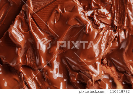 Sweet melted chocolate background. Mass of chocolate. Sweet melted chocolate background. Mass of chocolate. 110519782