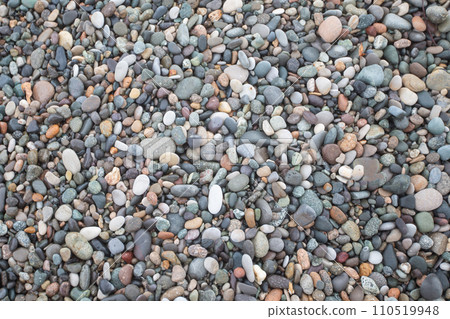Texture of diverse sea pebbles. Stone beach. 110519948