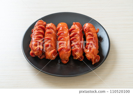 deep fried sausage skewer on plate 110520100