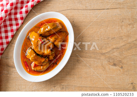Redtail Catfish Fish in Dried Red Curry Sauce that called Choo Chee Redtail Catfish Fish in Dried Red Curry Sauce that called Choo Chee 110520233