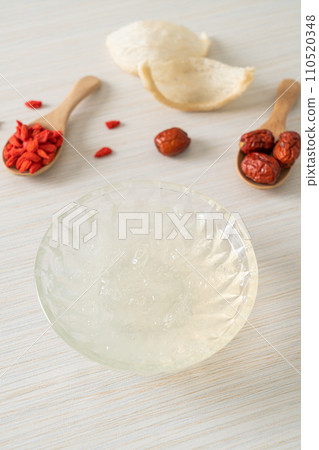 Edible bird's nest soup in glass bowl 110520348