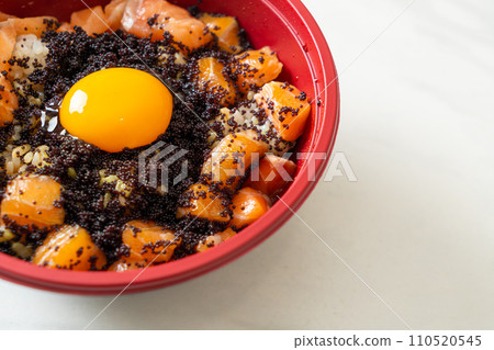 Japanese Rice with Fresh Salmon Raw, Tobiko and Egg (Salmon Don) 110520545