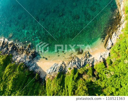 Aerial view seashore with mountains at Phuket Thailand, Beautiful seacoast view at open sea in summer season,Nature Environment and Travel background Aerial view seashore with mountains at Phuket Thailand, Beautiful seacoast view at open sea in summer season,Nature Environment and Travel background 110521363