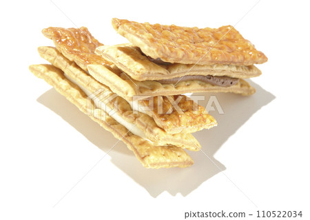 Chocolate and vanilla pie cream sandwich photographed against a white background 110522034