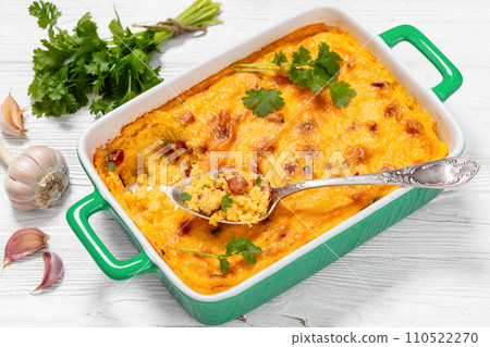 cheesy smoked sausage grits bake in ceramic dish cheesy smoked sausage grits bake in ceramic dish 110522270