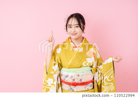 Young woman in long-sleeved kimono Young woman in long-sleeved kimono 110522994