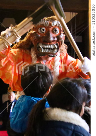 A red demon heading towards a child 110523010