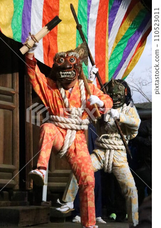 A demon stepping on four legs in a demon chasing ceremony 110523011