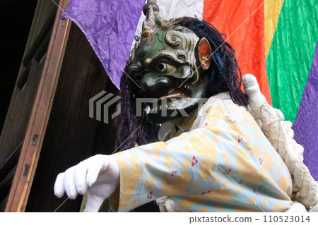Blue demon reaching out during the demon chasing ceremony at Kakurinji Temple 110523014