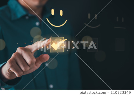 Business man select satisfied survey rating for customer satisfaction scores. customer satisfaction concept. Business man select satisfied survey rating for customer satisfaction scores. customer satisfaction concept. 110523349