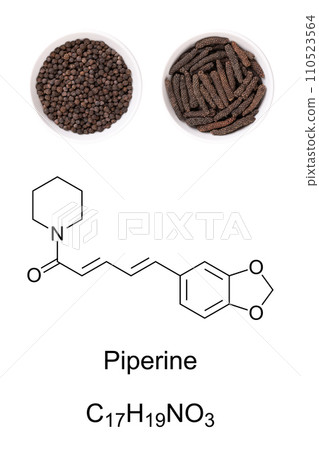Dried black peppercorns and long pepper catkins in white bowls, with chemical formula and structure of piperine, the compound, responsible for the pungency. Used as spice and in traditional medicine. 110523564