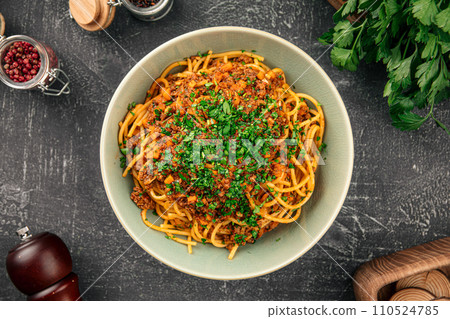 Portion of spaghetti bolognese with herbs Portion of spaghetti bolognese with herbs 110524785