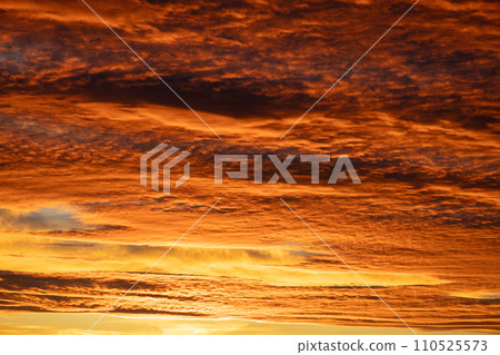 Orange sunset dramatic clouds on sky Orange sunset dramatic clouds on sky 110525573