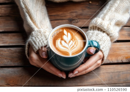 Woman holding cup of hot coffee on rustic wooden table, closeup photo of hands in warm sweater with mug, winter morning concept, top view. AI Woman holding cup of hot coffee on rustic wooden table, closeup photo of hands in warm sweater with mug, winter morning concept, top view. AI 110526590