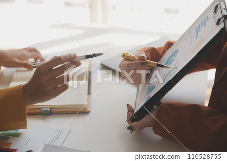 .Team of business people working together in the meeting room office, teamwork background charts and graphs banner, double exposure successful teamwork,business planning concept. .Team of business people working together in the meeting room office, teamwork background charts and graphs banner, double exposure successful teamwork,business planning concept. 110528755