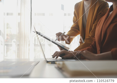 .Team of business people working together in the meeting room office, teamwork background charts and graphs banner, double exposure successful teamwork,business planning concept. 110528779