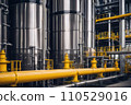 Equipment and piping inside of modern industrial petrochemical power plant for gas or oil industry. Oil refinery plant from industry, pipe line steel close up. AI 110529016