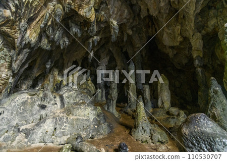 Cave with stalactites and stalagmites. A cave in the mountain in Turkey close to Marmaris. Beautiful undeground view. Cave with stalactites and stalagmites. A cave in the mountain in Turkey close to Marmaris. Beautiful undeground view. 110530707