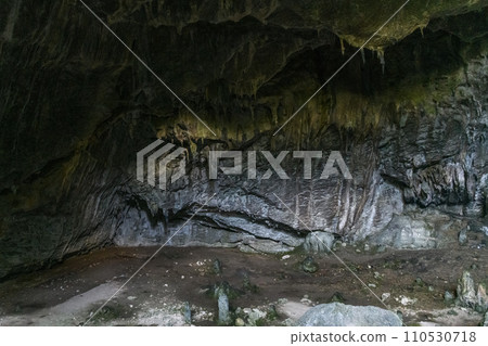 Cave with stalactites and stalagmites. A cave in the mountain in Turkey close to Marmaris. Beautiful undeground view. 110530718
