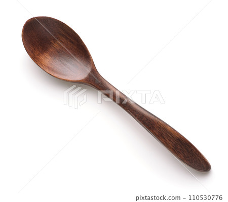 Top view of dark brown wooden teaspoon 110530776