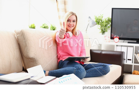 young pretty blond woman hold tablet in arms show big finger super young pretty blond woman hold tablet in arms show big finger super 110530955