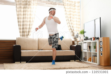 Young handsome man in shorts and 110531001