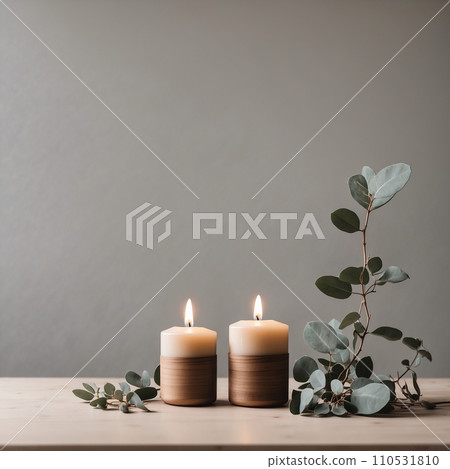 Minimal still life with white candles and eucalyptus on grey wall background, home details innterior concept Minimal still life with white candles and eucalyptus on grey wall background, home details innterior concept 110531810