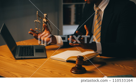 Judge gavel with Justice lawyers having team meeting at law firm background. Concepts of Law and Legal services. Judge gavel with Justice lawyers having team meeting at law firm background. Concepts of Law and Legal services. 110533164