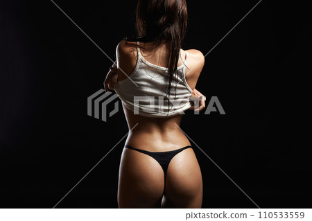 Sexy girl taking off her shirt. Wet Hair Beautiful Girl Sexy girl taking off her shirt. Wet Hair Beautiful Girl 110533559